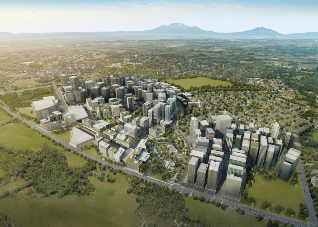 Evo City commercial core surrounded by greenery in Kawit, Cavite